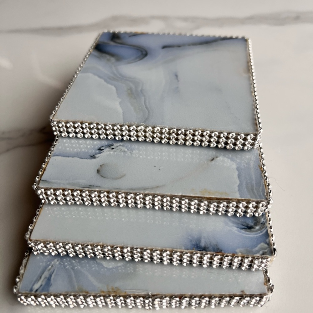 Blue set of four tile coasters with Crystal accents 4” x4”.